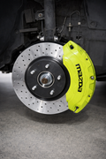 Yellow custom caliper cover on Mazda CX5
